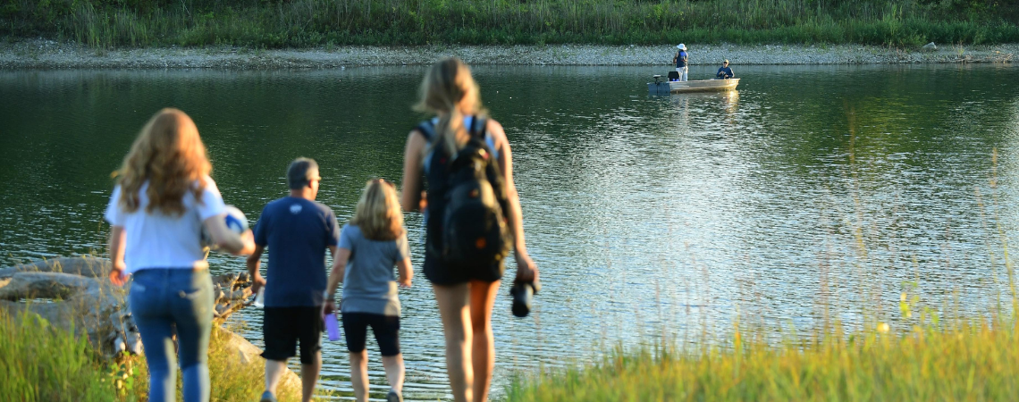 People by lake